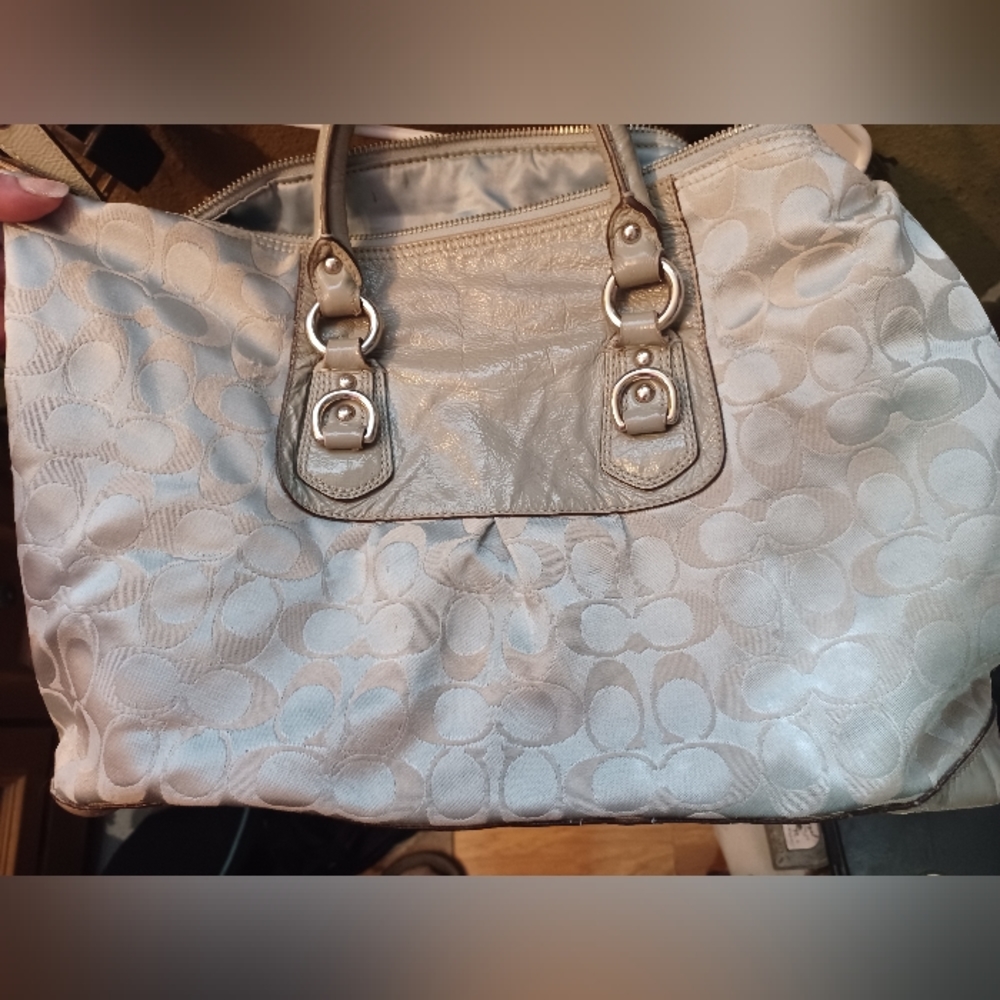 Authentic Coach satchel. This is a lg bag. Light blue/green in color.